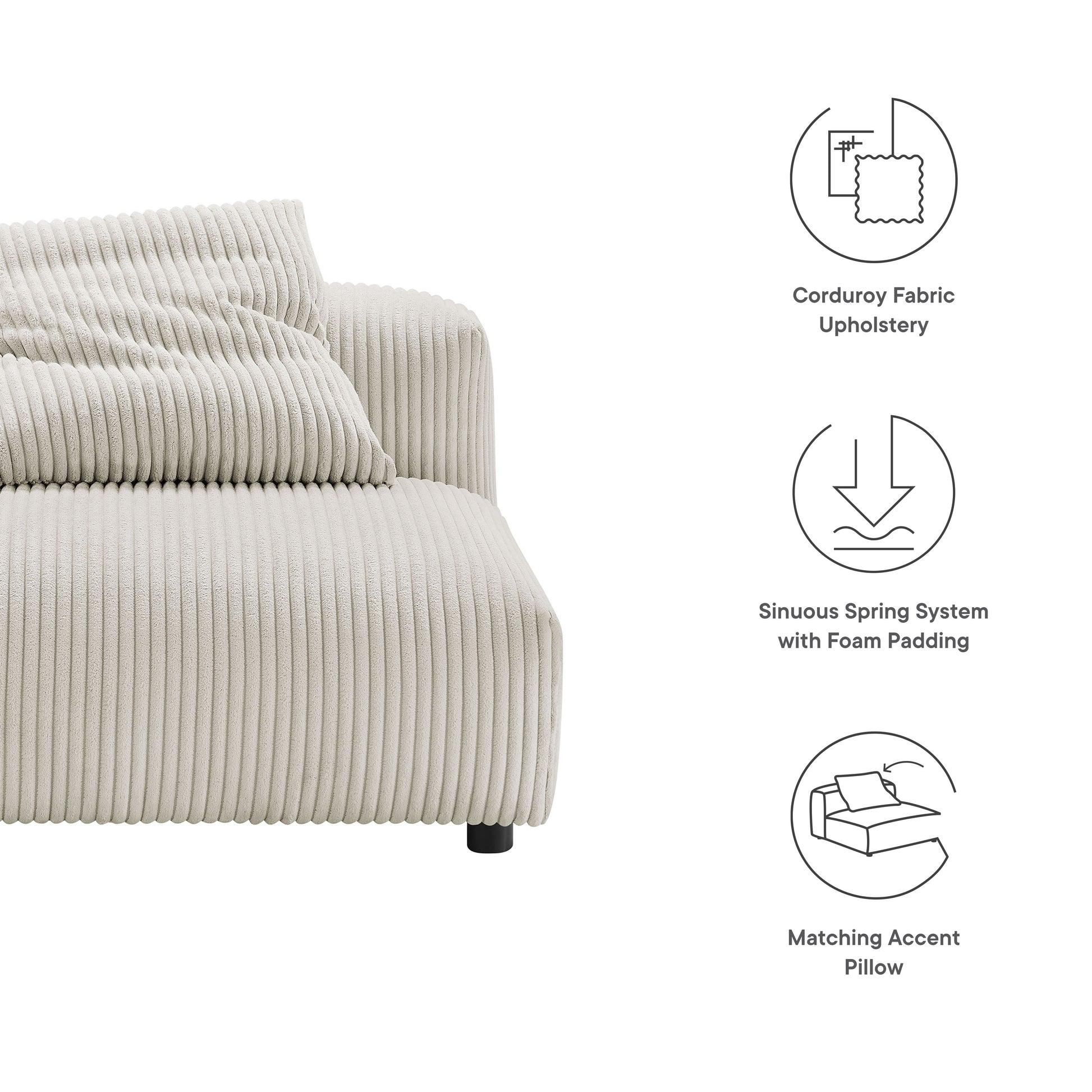 Almond corduroy armless chair with ribbed upholstery in a modern lounge setting.