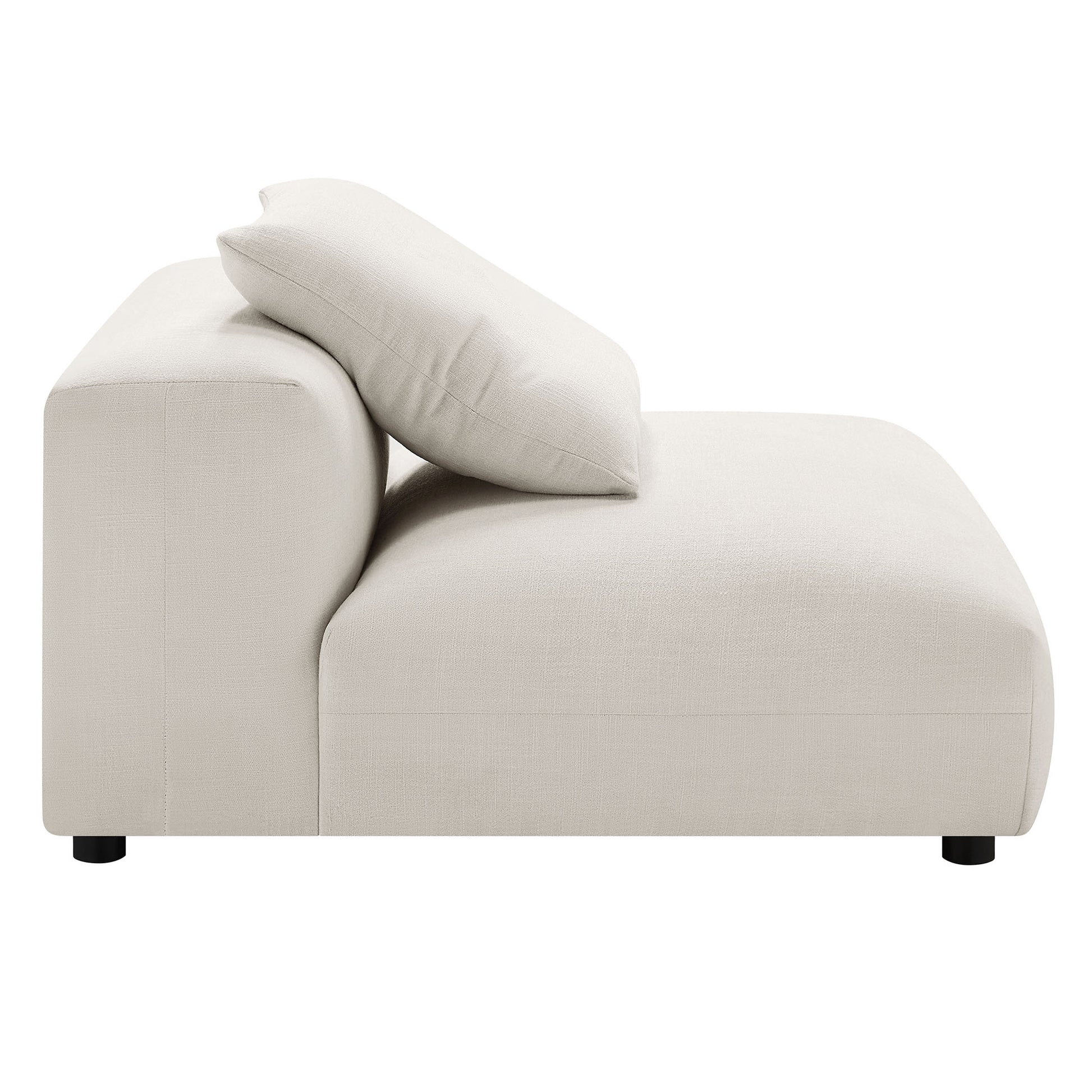 Gray fabric modular sectional sofa with chaise, low-profile black legs, loose cushions, modern minimalist style.