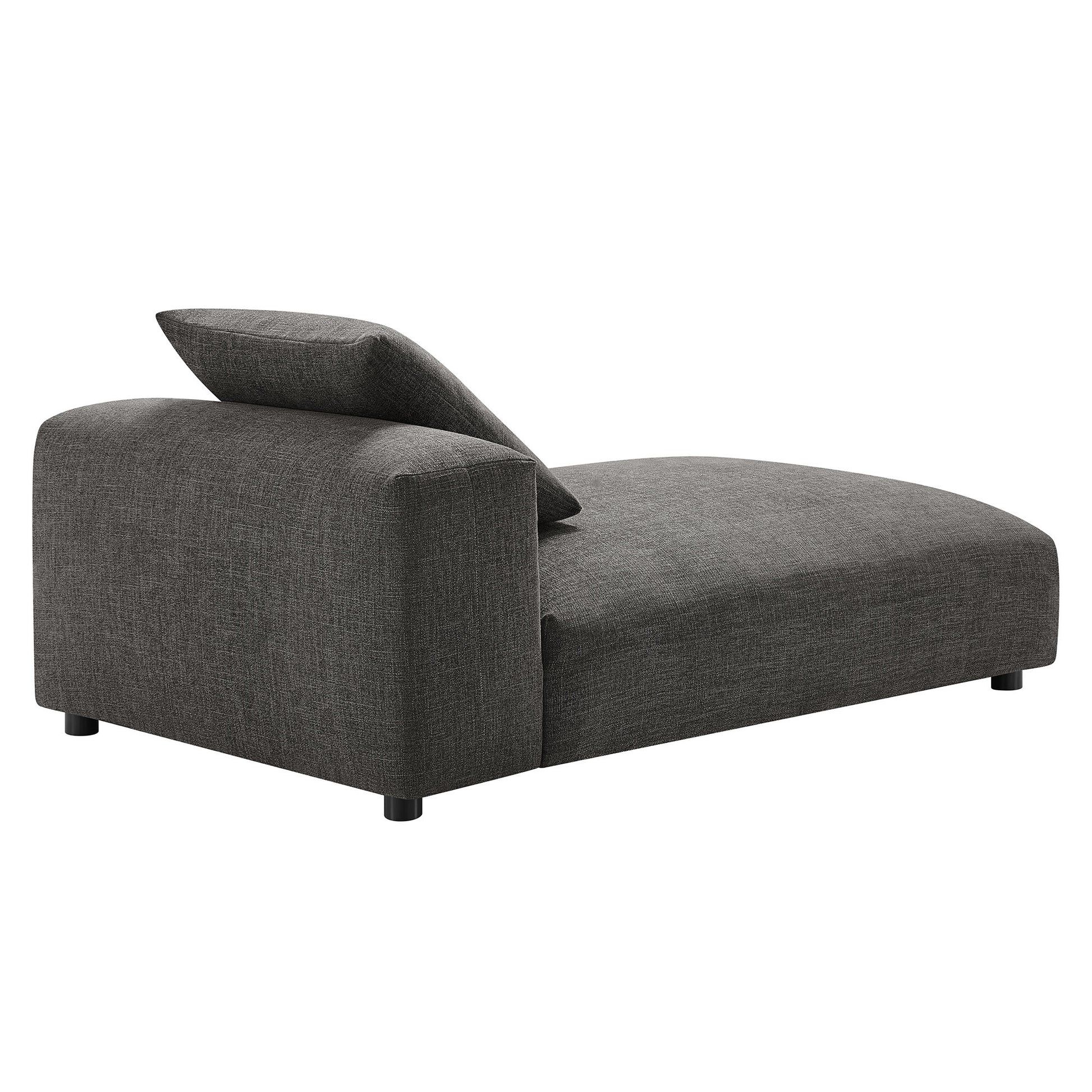 Charcoal gray fabric chaise lounge with back cushion and low legs, modern living-room seating.