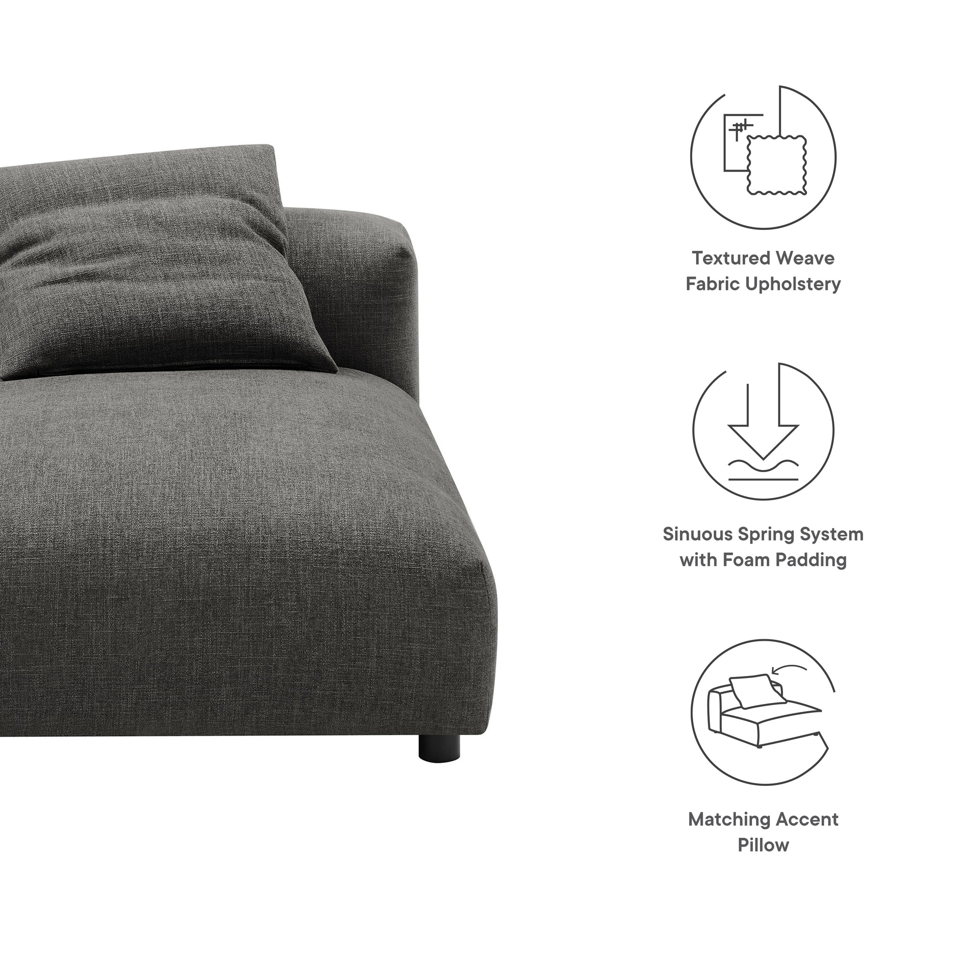 Dark gray textured weave fabric armless chaise lounge with a low-profile curved edge and a matching accent pillow.