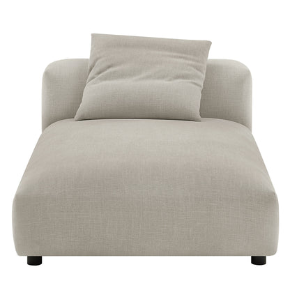 Beige linen armless chaise lounge with a back cushion; modern minimalist seating.