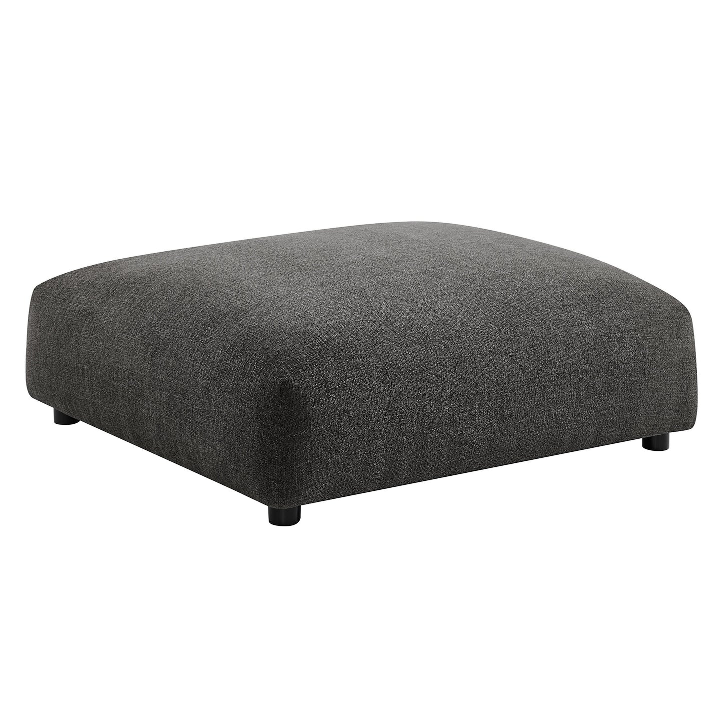 Charcoal gray fabric ottoman with rounded edges, low profile, rectangular shape and short black feet.