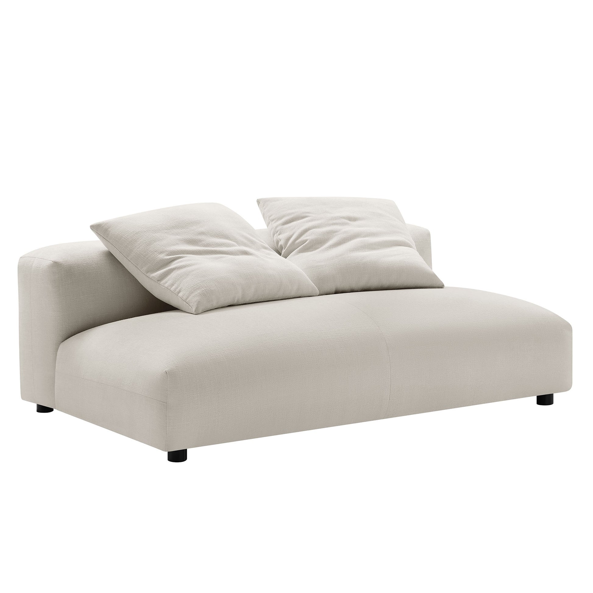 Gray fabric armless loveseat with ottoman in a modular set; two plush cushions, rounded edges, low-profile contemporary style.