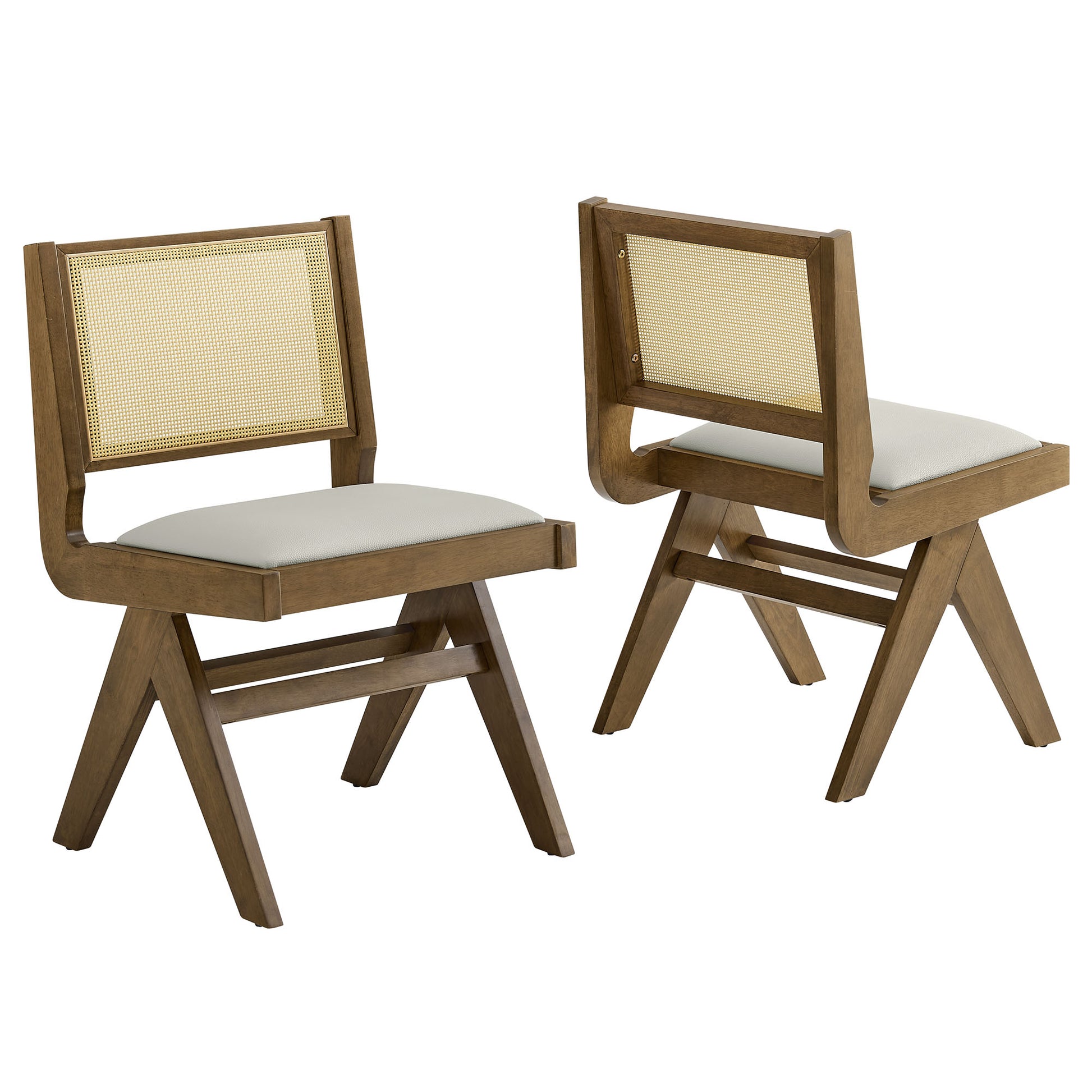 Pair of gray vegan-leather and cane dining chairs with caned backrests and X-frame legs.