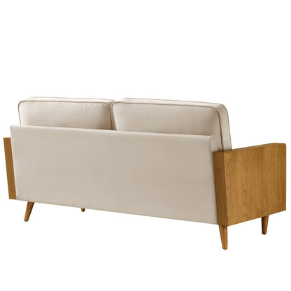 Gray velvet sofa with walnut wood arm panels and tapered legs, mid-century modern.