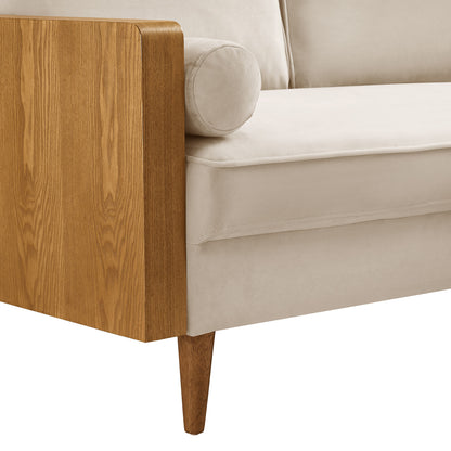 Mid-century modern sofa with gray velvet upholstery and tapered legs.