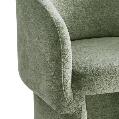 Sage green chenille dining armchair with curved armrest and plush cushion.