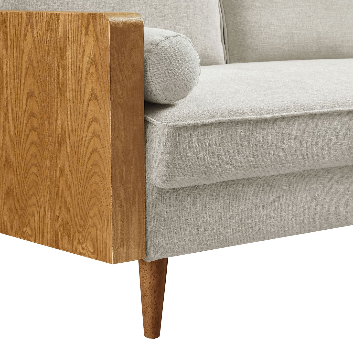 Walnut-finish wooden armrests & tapered legs with white heathered fabric upholstery on a mid-century style sofa.