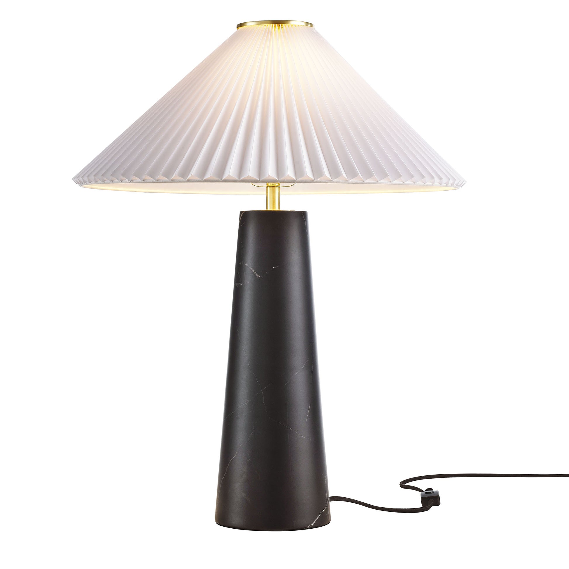 Black marble table lamp with a tapered silhouette, white cone-shaped pleated shade, gold accents, corded.