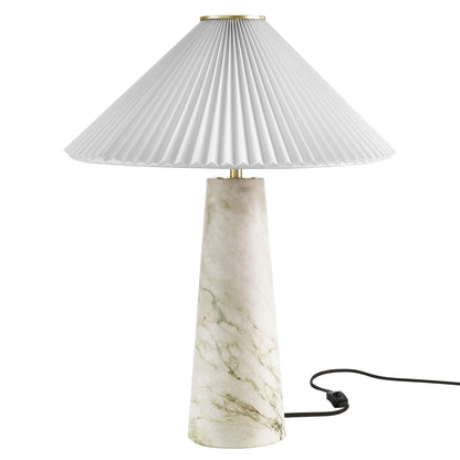 White marble tapered-base table lamp with cone-shaped pleated shade, brass accent, exposed cord.