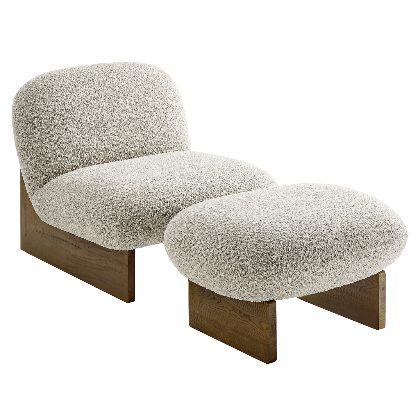 Beige boucle lounge chair with rounded back and matching ottoman on walnut wood bases