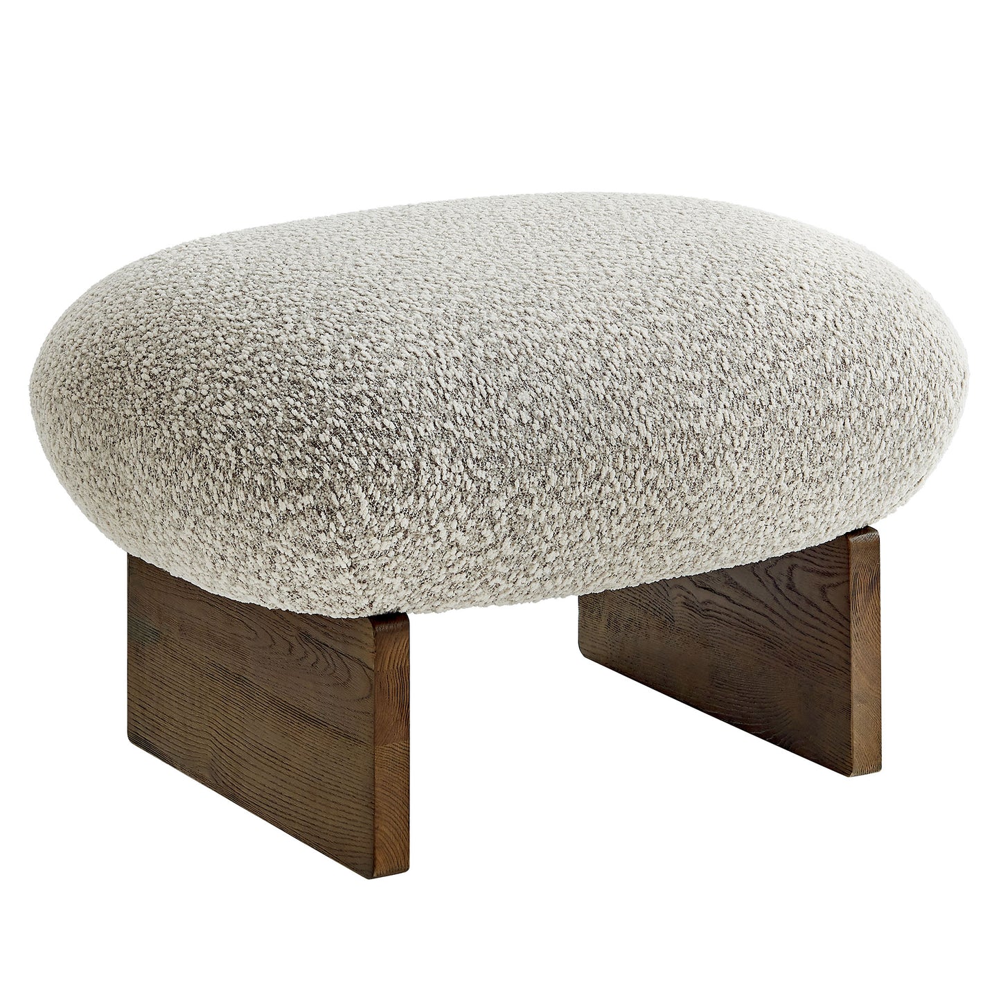 Round brown boucle ottoman with two walnut-finish wooden legs, modern rustic style.