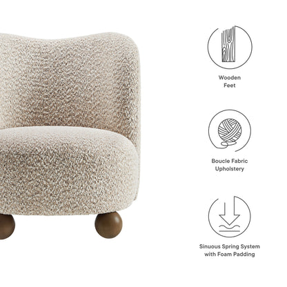 Brown boucle fabric accent chair with rounded back and wooden ball feet, cozy modern style.