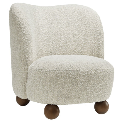 Brown boucle fabric accent chair with curved back and rounded seat on dark wooden ball legs.