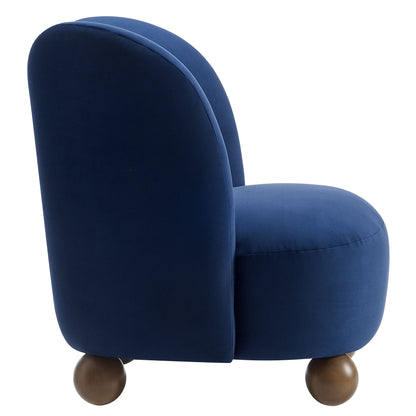 Mid-century brown velvet accent chair with rounded back, circular seat, and wooden ball feet.