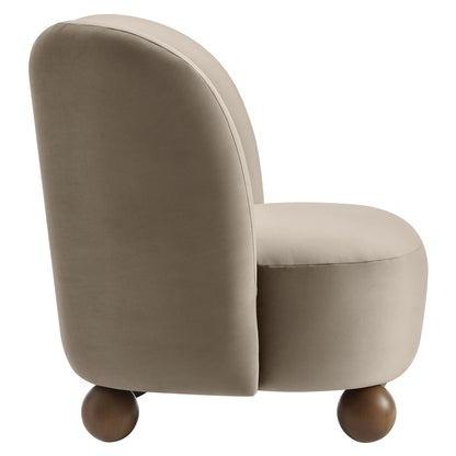 Taupe upholstered barrel accent chair with rounded back, cushioned seat, and wooden ball feet.