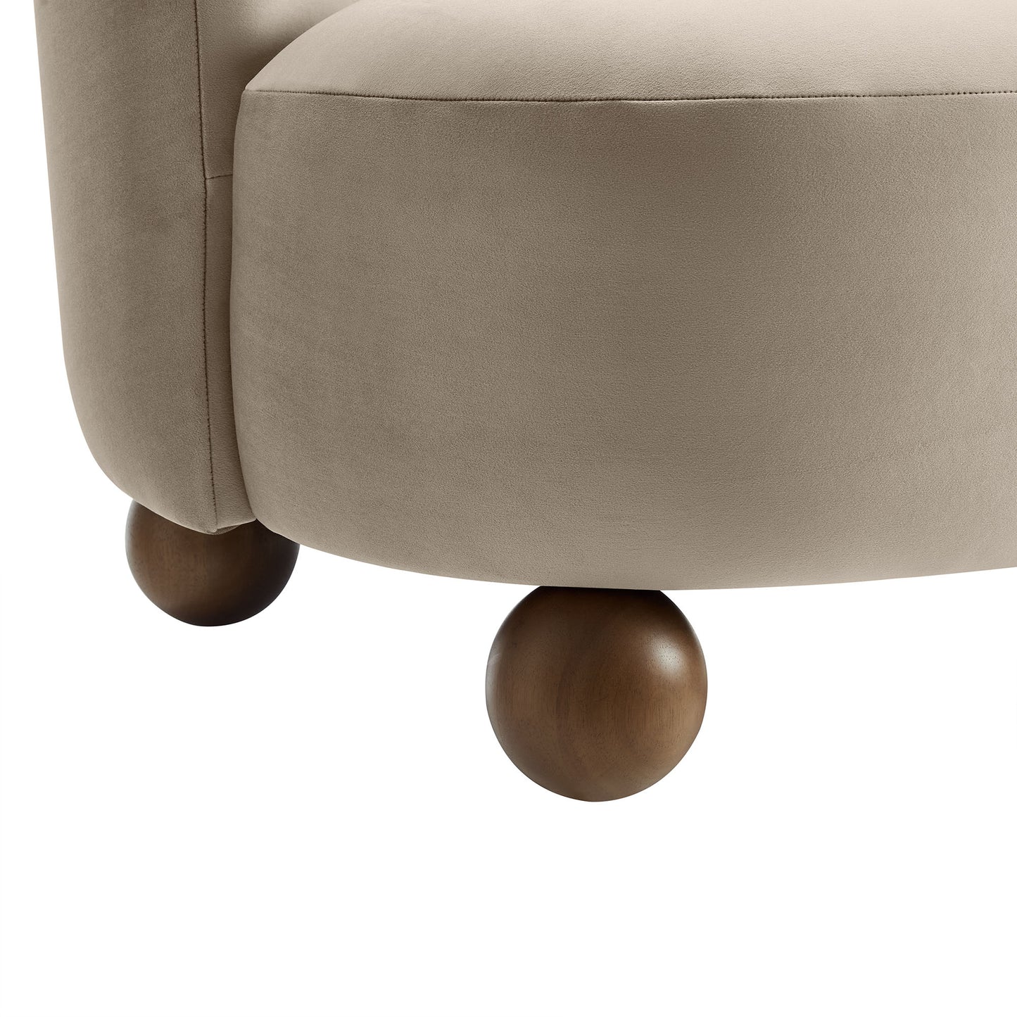 Taupe fabric upholstered accent chair with rounded walnut wood ball feet.