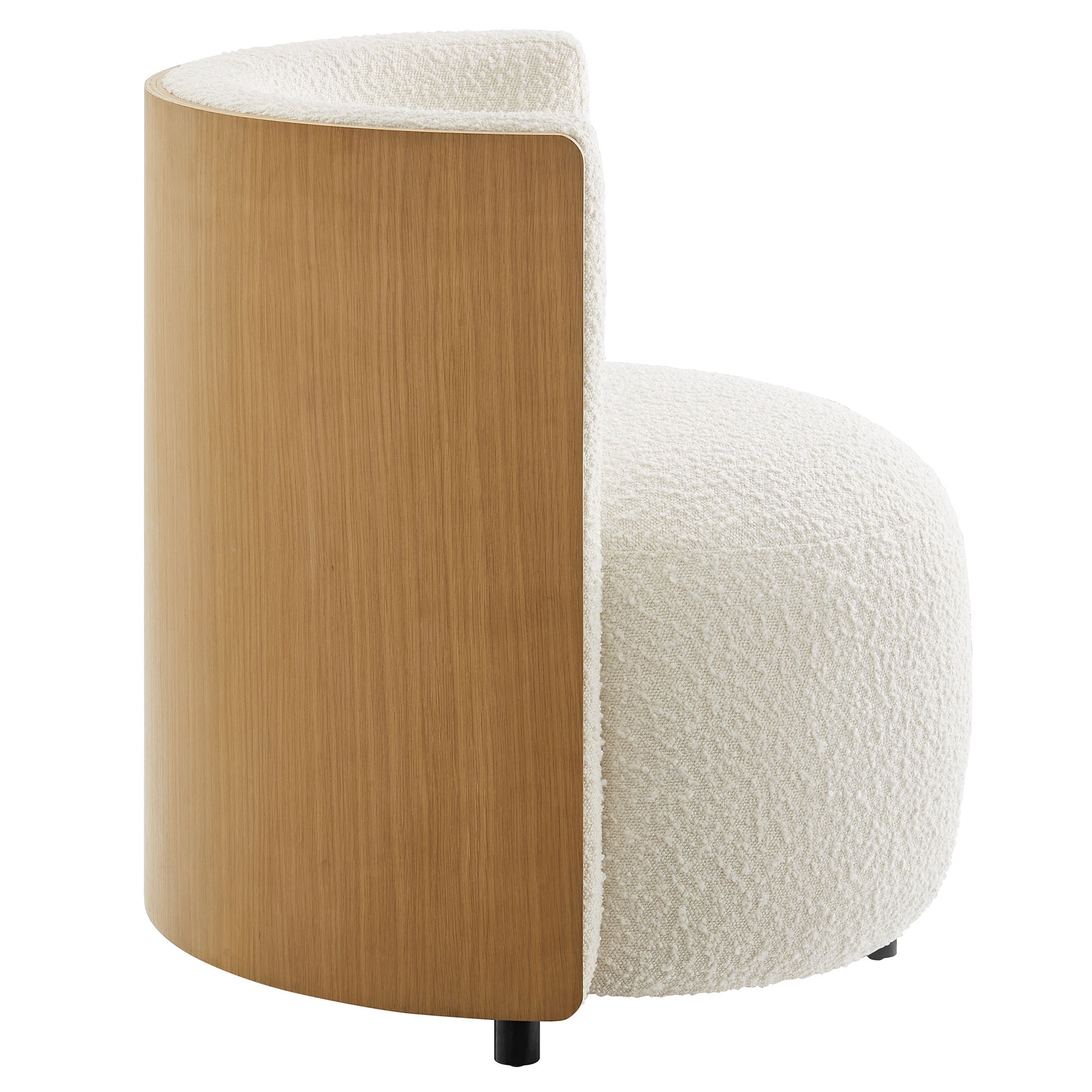 Natural wood curved back panel with ivory boucle upholstery on a rounded accent chair.