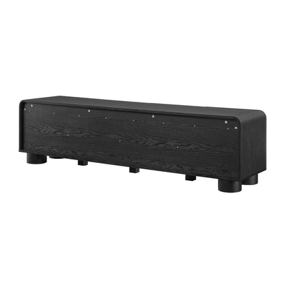 69-inch long black wood-grain low-profile TV stand with rounded ends and short feet; suitable for TVs and media components.