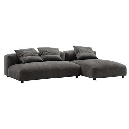 Charcoal gray fabric L-shaped sectional with chaise, low-profile arms, plush cushions, modern modular sofa.