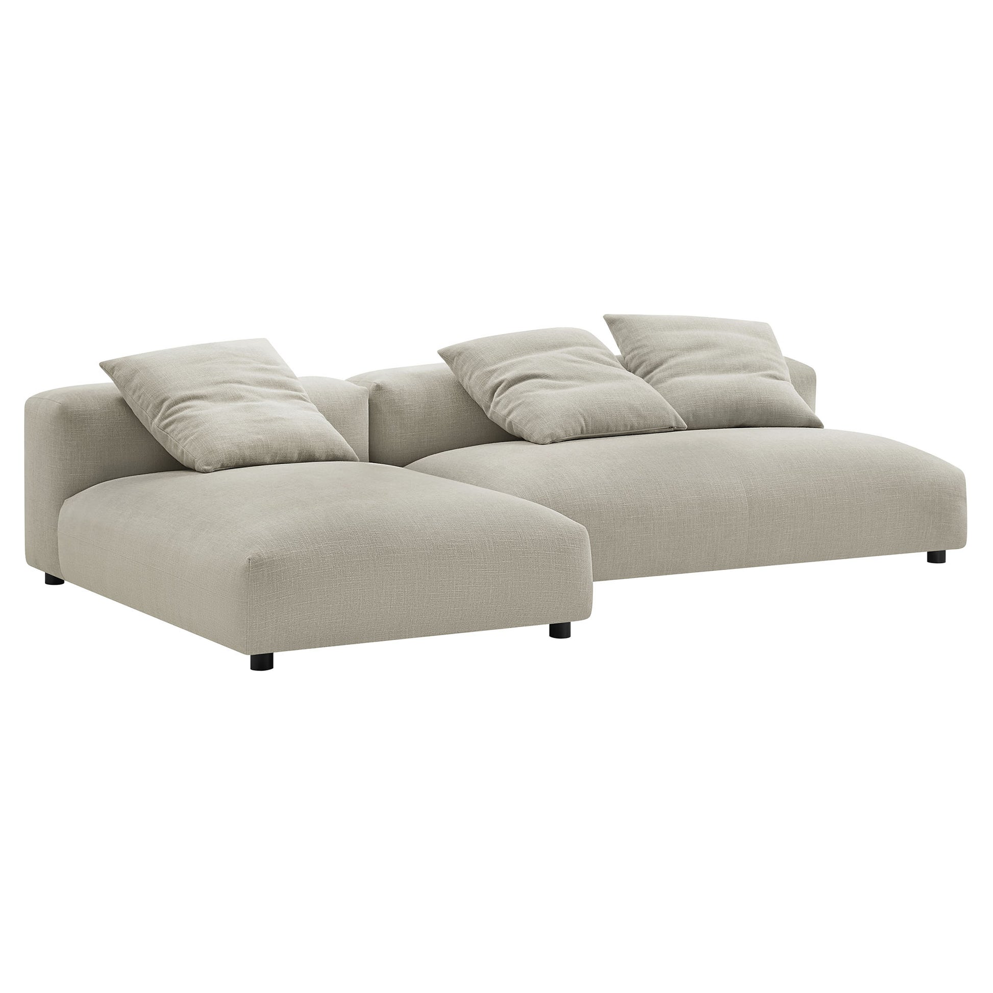 Beige linen sectional sofa with left chaise, low arms, three back cushions for modern living room seating.