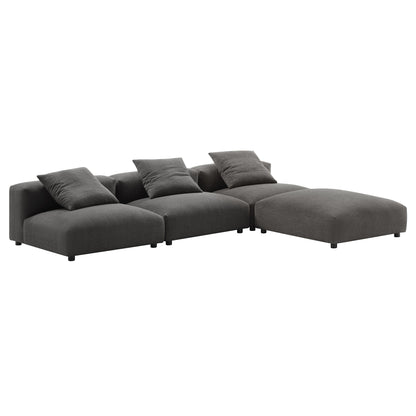 Charcoal gray fabric sectional with chaise, low-profile arms & plush back cushions.