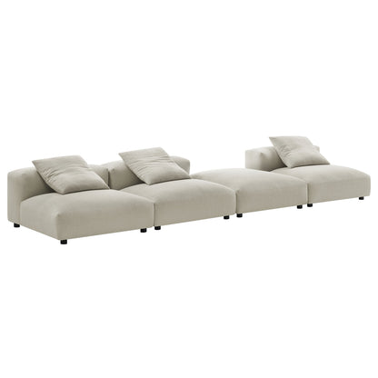 Brown linen modular sectional sofa with four connected sections, low arms, plush cushions, black legs.