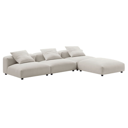 Gray fabric four-piece modular sectional sofa with right-side chaise and matching cushions; modern style.