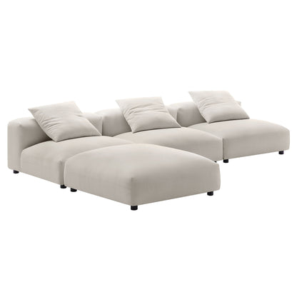 Gray fabric modular sectional sofa with left chaise, three cushions, and low black legs.