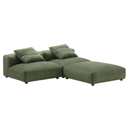 Olive green corduroy sectional sofa with chaise, two matching cushions, low-profile legs, modular L-shape.