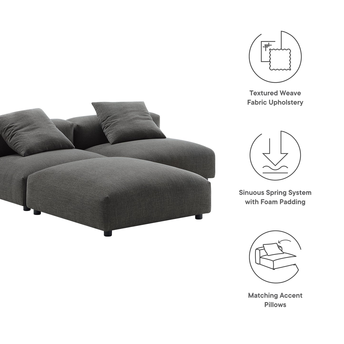 Charcoal gray textured-weave fabric sectional with chaise and matching accent pillows in a modern low-profile design.