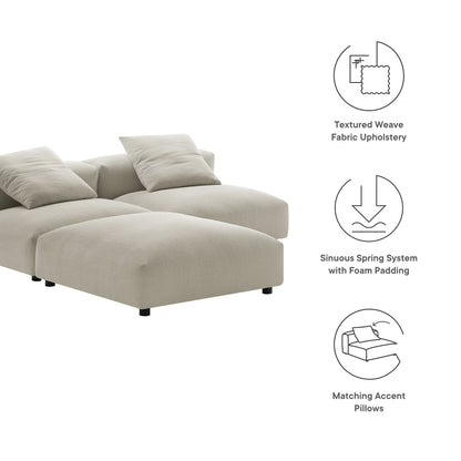 Brown textured weave fabric sectional with chaise and plush cushions, matching accent pillows.