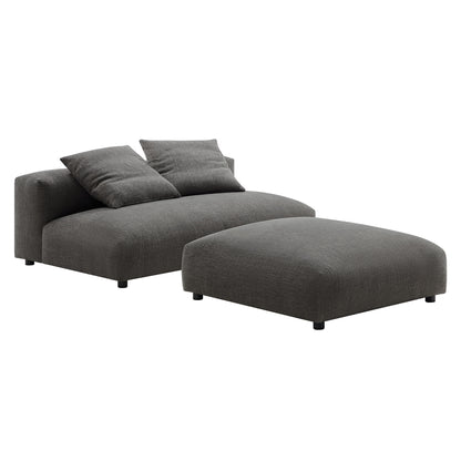 Charcoal gray fabric armless loveseat with ottoman; modular, low-profile sofa set.