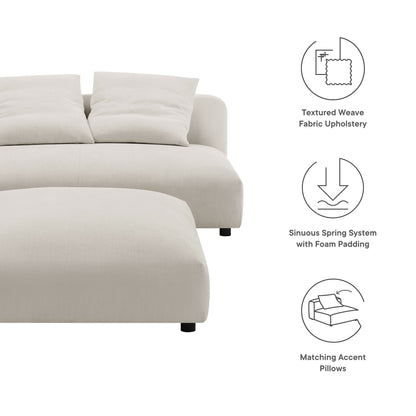 Gray modular upholstered fabric armless loveseat and ottoman set with foam-padded cushions and matching accent pillows.