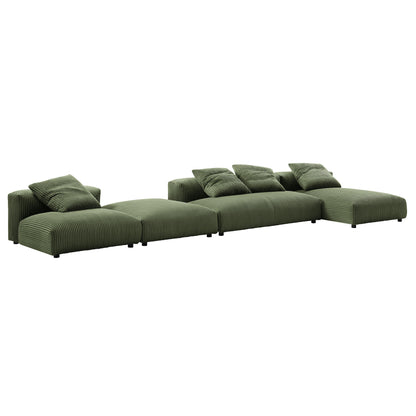 Olive green corduroy modular sectional sofa with multiple cushions and an ottoman, low-profile legs.