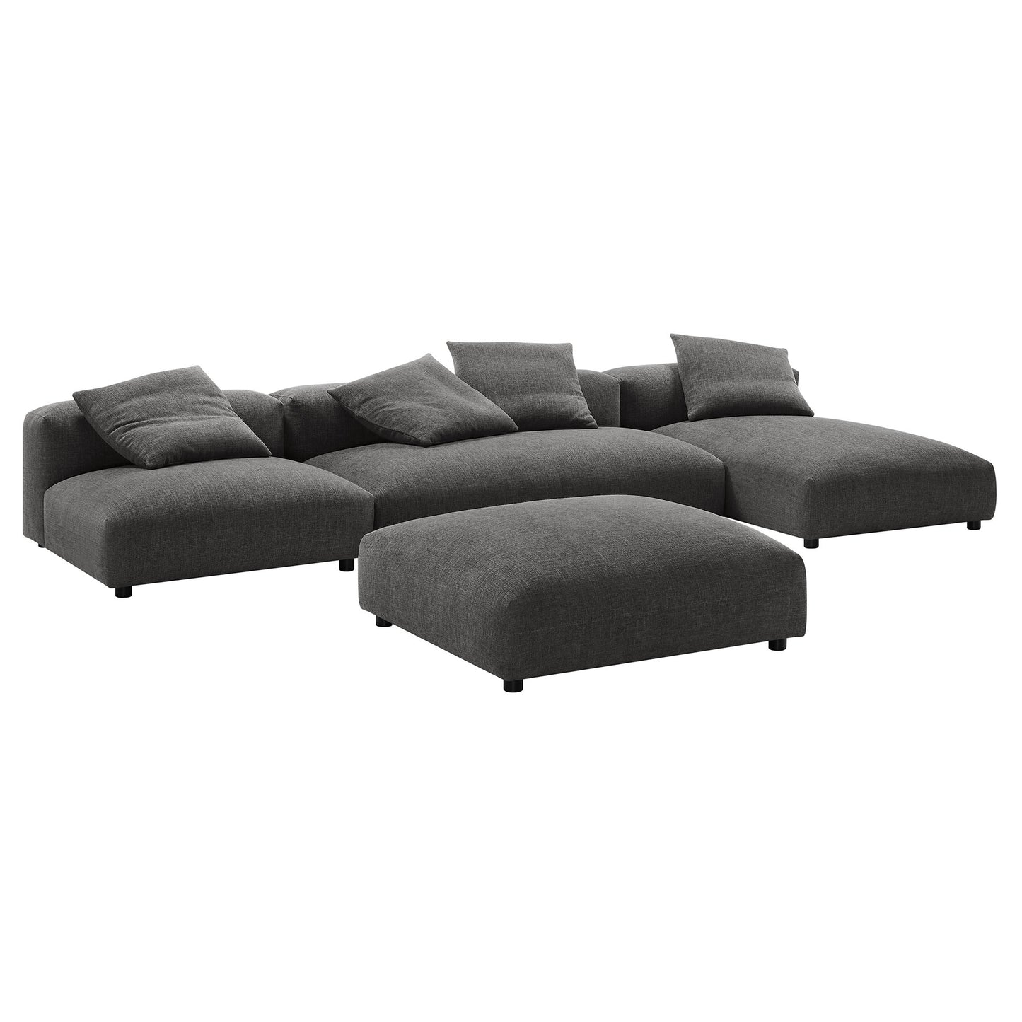 Charcoal gray fabric sectional with chaise and modular cushions, a low-profile modern sofa with a matching ottoman.
