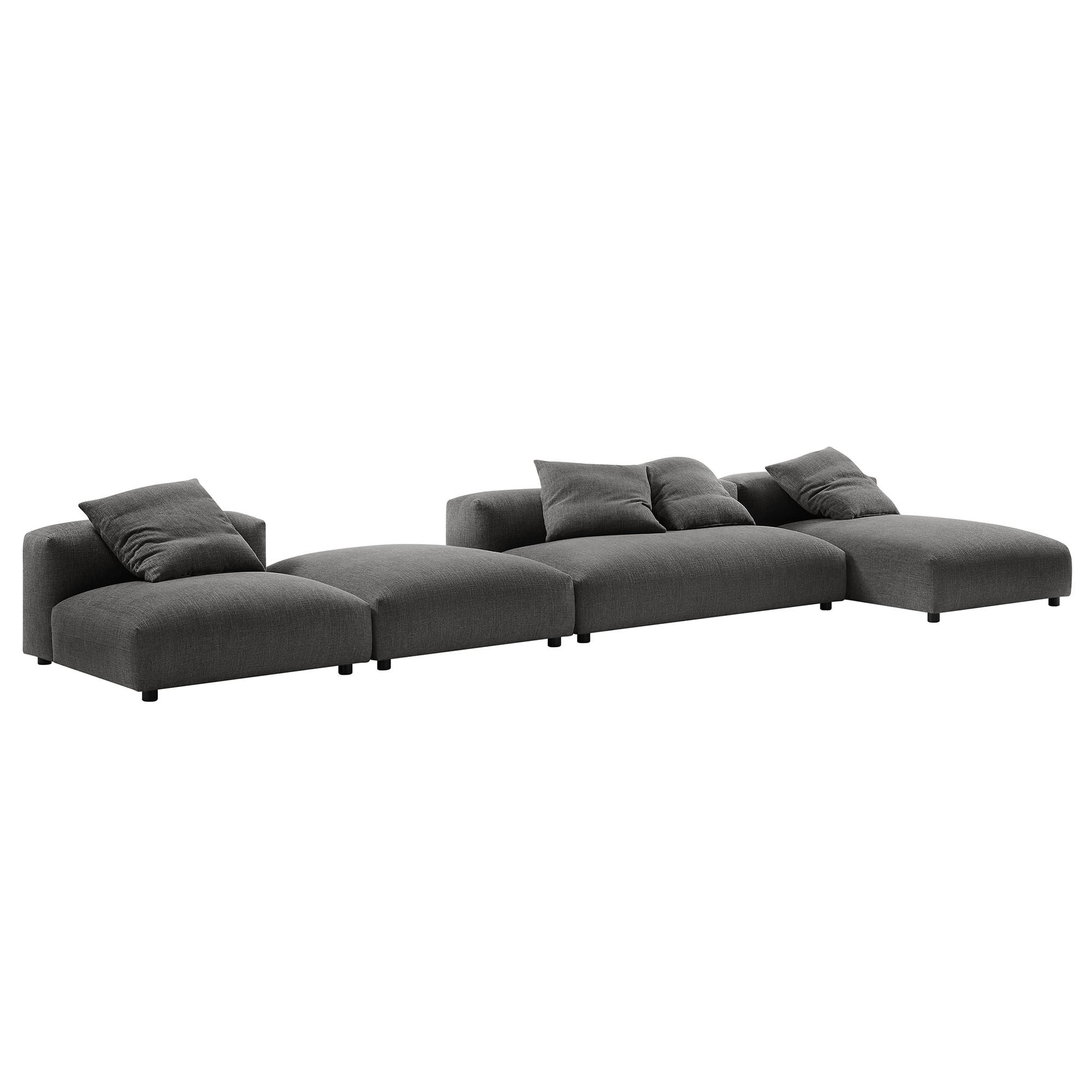 Charcoal gray fabric modular sectional sofa with ottoman, low-profile legs & plush cushions.