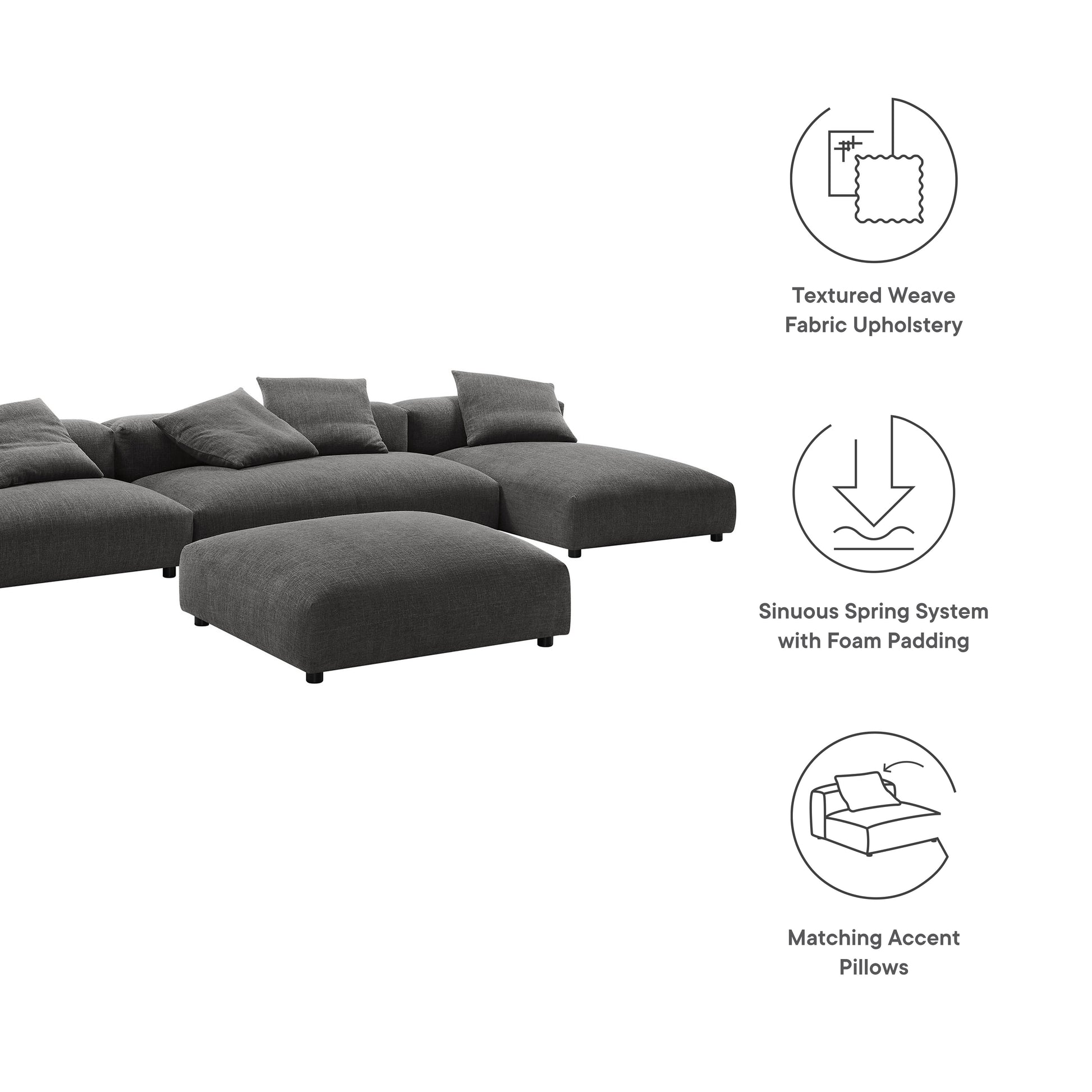 Charcoal gray sectional sofa with ottoman in textured weave fabric, matching accent pillows.