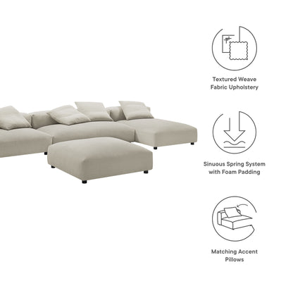 Brown modular sectional sofa with ottoman; textured fabric upholstery, foam-padded cushions, and matching accent pillows.