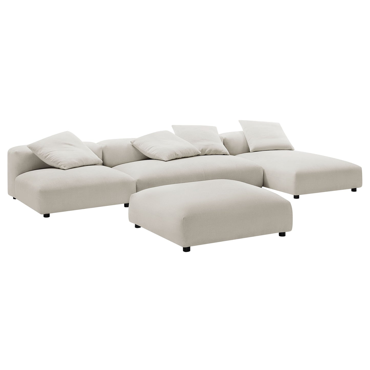 Gray fabric modular sectional with chaise and ottoman, low-profile legs, plush cushions for modern living spaces.