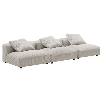 Brown corduroy modular sectional sofa with three seats and three matching pillows, low black legs.