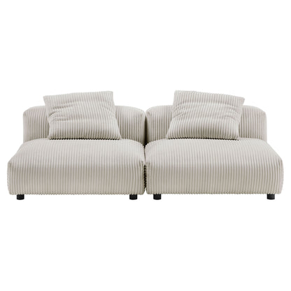 Brown corduroy modular sofa, 2-piece with matching back cushions and low block legs.