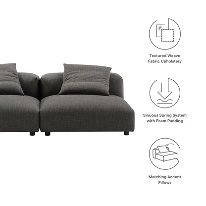 Dark gray textured weave fabric 2-piece modular upholstered sofa with foam-padded cushions and matching accent pillows.