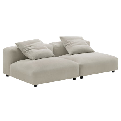 Beige linen fabric modular sofa with two wide seats, two back cushions and low-profile black feet.