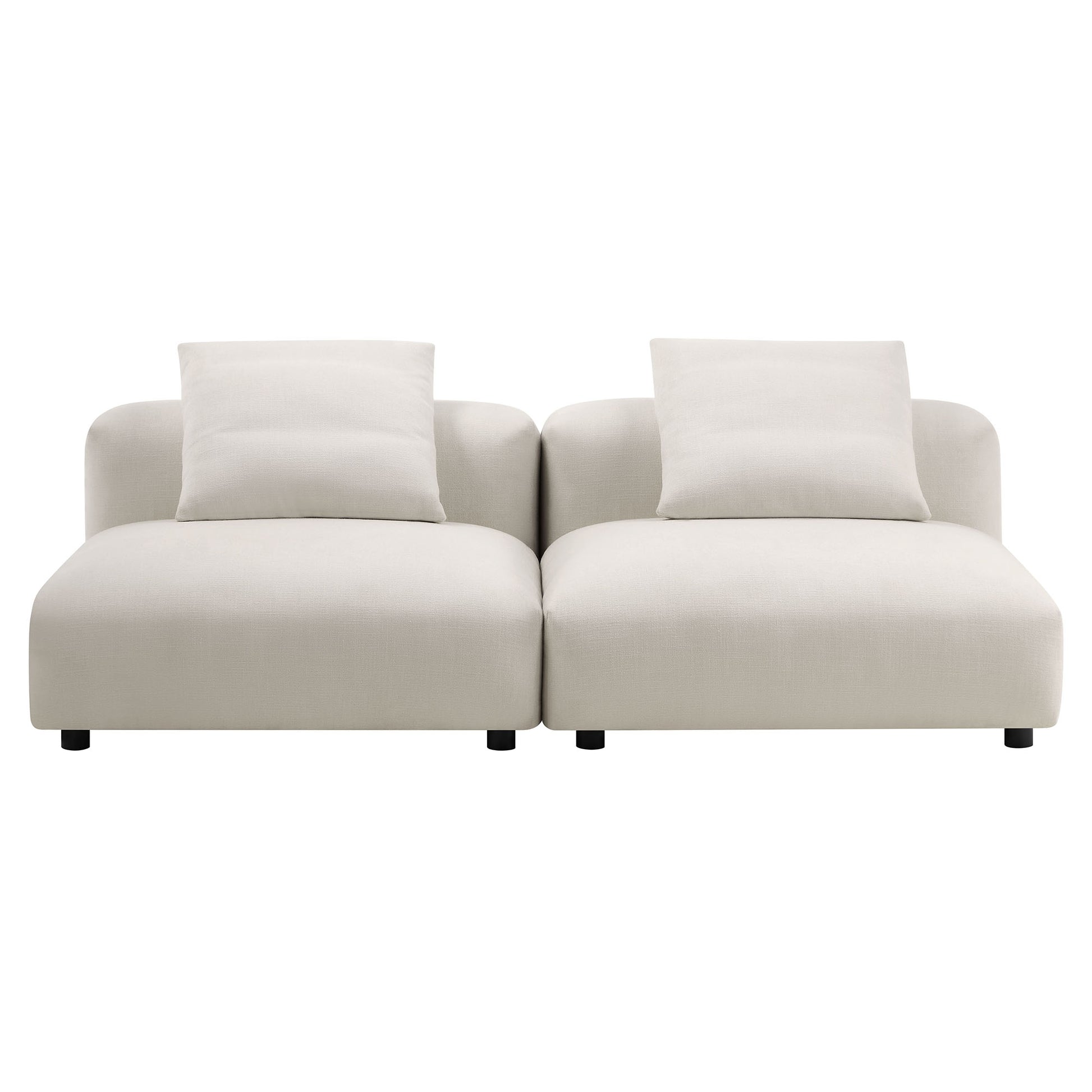 Gray modular sofa with two connected seats, cushioned arms, two throw pillows, low-profile design and short dark legs.