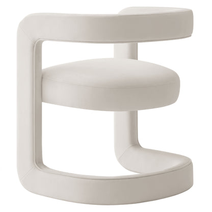 Cream velvet-upholstered circular-frame dining chair with curved armrests, modern sculptural design.