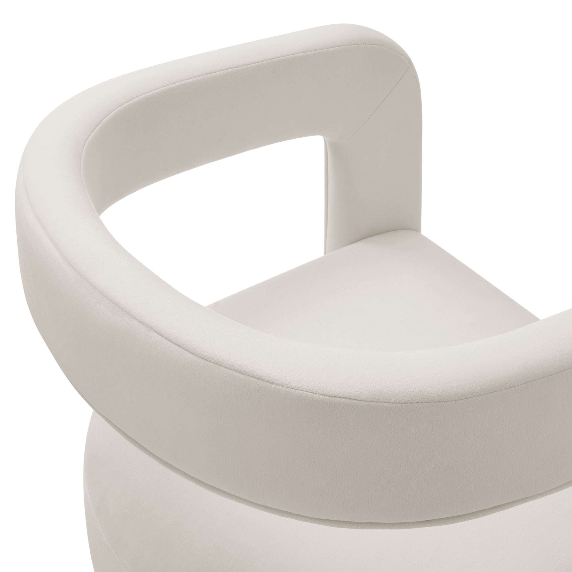 Cream upholstered dining chair with a circular loop armrest and rounded back, modern minimalist seating.