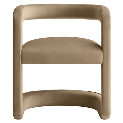 Taupe velvet barrel dining chair with rounded tubular frame and cushioned seat; modern curved design.