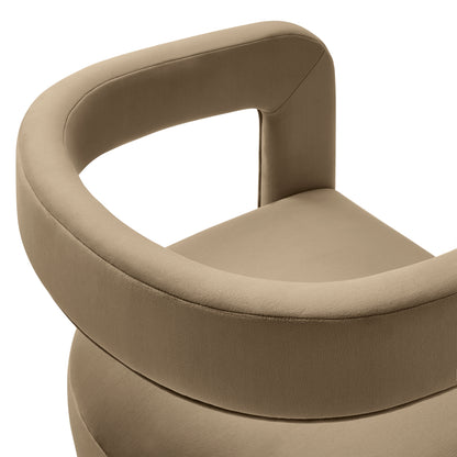 Taupe velvet dining chair with a cushioned seat and rounded barrel back in a modern design.