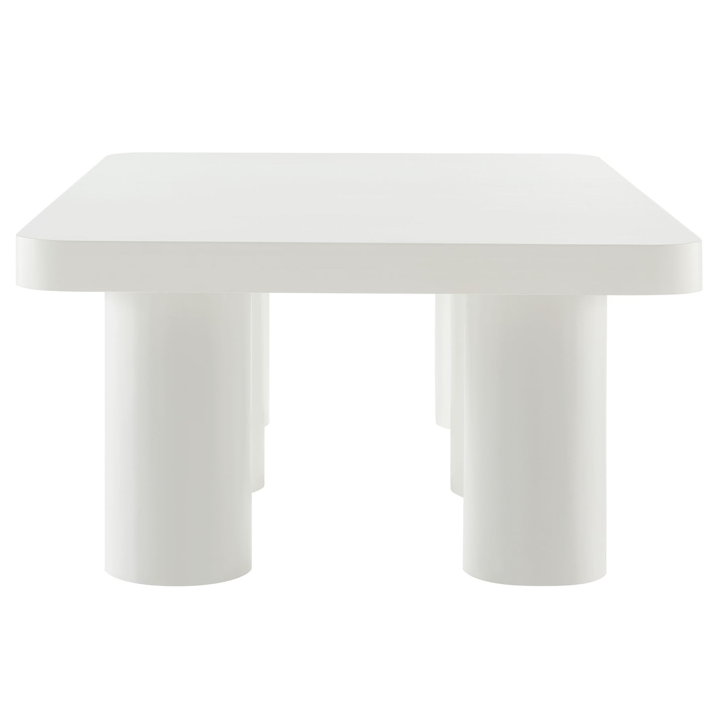 White rectangular coffee table with rounded corners and chunky cylindrical legs.